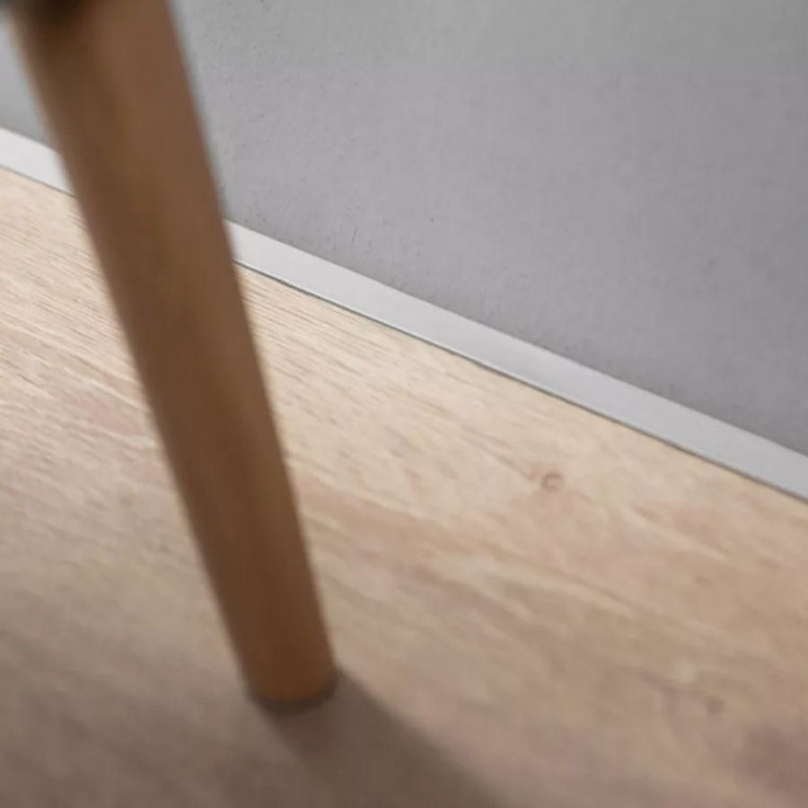 Микроплинтус алюминиевый серебристый с пружинами Микроплинтус алюминиевый серебристый с пружинами